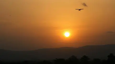 Patricia Mawuli-Porter Patricia, pictured flying at sunset in Ghana