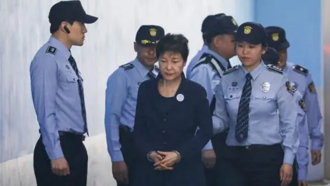 AFP In this file photo taken on 23 May 2017 South Korean ousted leader Park Geun-hye arrives at a court in Seoul.