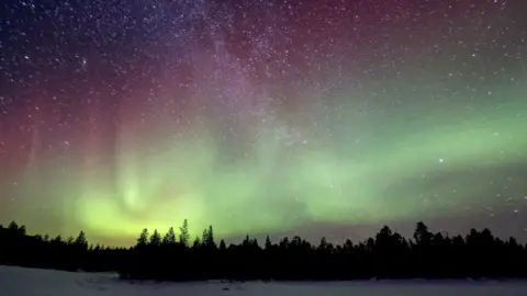 Getty Images The Northern Lights appearing over Finland