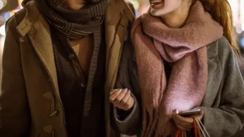 Getty Images Stock image of couple walking on a date