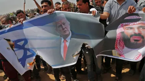 Getty Images Palestinians in Gaza protest against Saudi Crown Prince Mohammed bin Salman, Donald Trump and Israel (April 2018)
