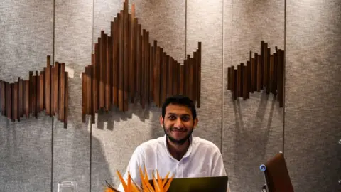 Getty Images This photo taken on November 20, 2018 shows Indian entrepreneur and founder of Oyo Rooms Ritesh Agarwal posing for a photo in New Delhi.