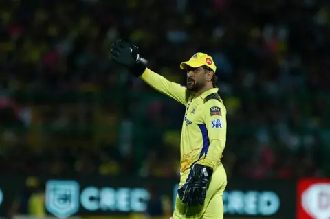 AFP MS Dhoni of Chennai Super Kings gestures during the IPL match between Rajasthan Royals and Chennai Super Kings at Sawai Mansingh Stadium on April 27, 2023 in Jaipur, India.(