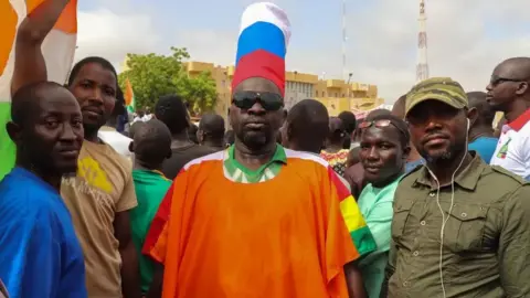 EPA A crowd of pro-military demonstrators at a march in Niger