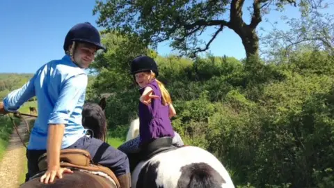 The Iris Project Iris horse riding with her dad