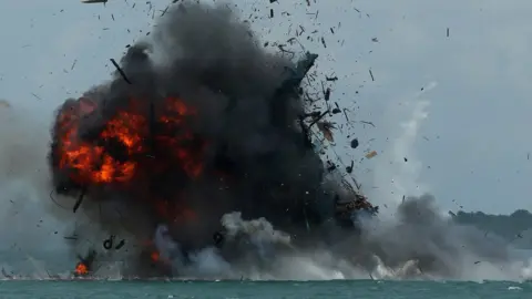 AFP One of seven fishing boats is blown up by the Indonesian government in Batam, Kepulauan Riau province on February 22, 2016. Indonesia sank 27 impounded foreign boats on February 22, a minister said, as the world's largest archipelago nation stepped up a campaign against illegal fishing in its waters.