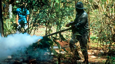 Spraying insecticide in villages is one way to eliminate malarial mosquitoes (Science Photo Library)