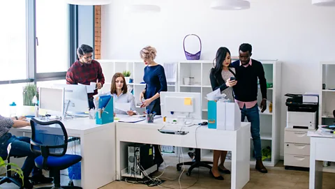 Alamy Asian American women report not being credited for their work and taking on the bulk of group projects, yet still not being considered leaders (Credit: Alamy)