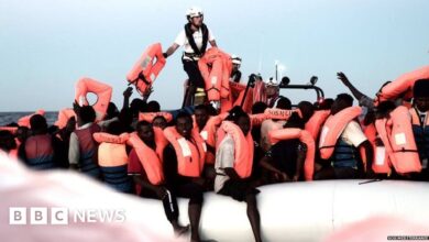 101964423 migrants.jpg