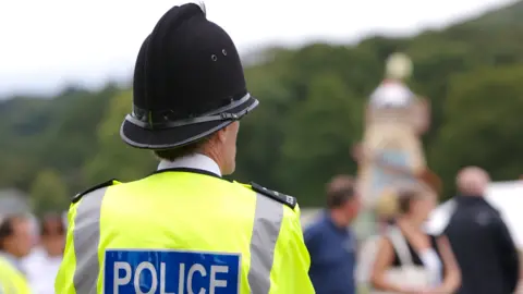 Getty Images A police officer in hi vis