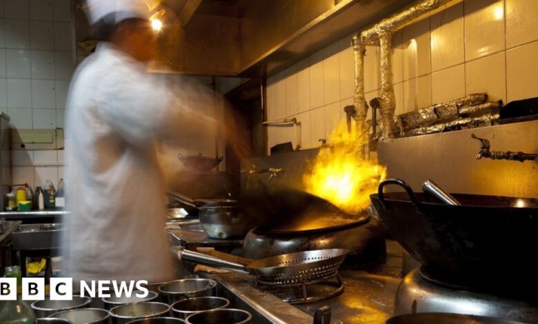 97749912 kitchenworkergetty.jpg