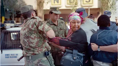 AFP Winnie Mandela being arrested in 1991 while staging a protest calling for the release of detainees on hunger strike