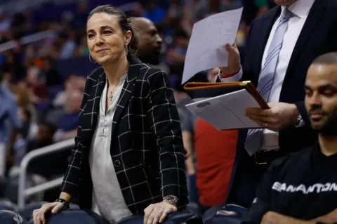 Christian Petersen Assistant coach Becky Hammon of the San Antonio Spurs