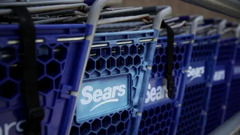 Getty Images The Sears logo is displayed on shopping carts outside of a Sears store on May 31, 2018 in Richmond, California.
