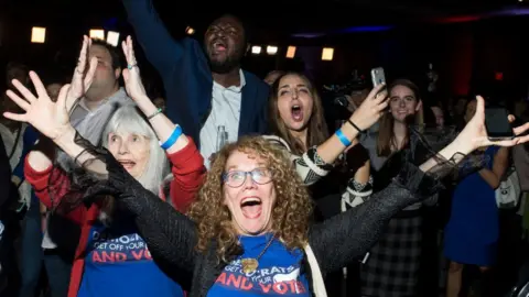 Getty Images Democrat supporters celebrate