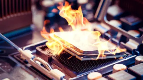 Getty Images Computer chip in flames