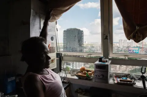 Holly-Marie Cato Florence in her flat opposite Grenfell Tower