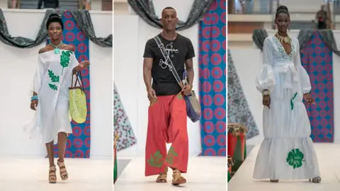 Kisley Jeannot Models show off clothes designed by Michel Chataigne