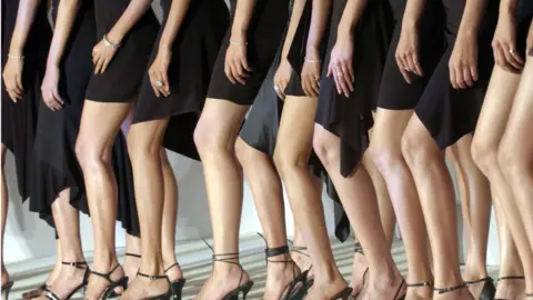 Getty Images Finalists for the Pond's Femina Miss India 2005 beauty pageant pose for photographers at a press conference in Bombay 07 March 2005.