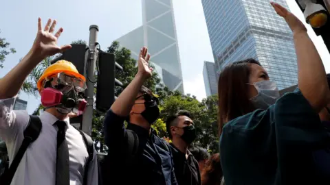 Reuters File image of anti-government demonstrators during a lunchtime protest in Hong Kong