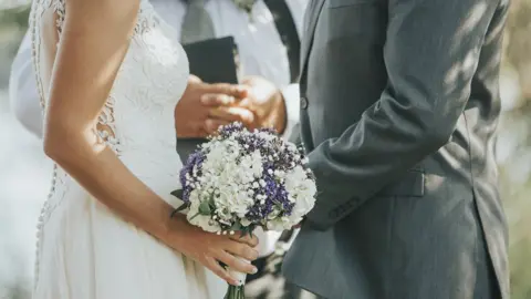 JenAphotographer/Getty Images Wedding stock photo