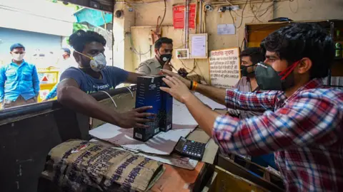 Getty Images Booze has increasingly become affordable to many in India