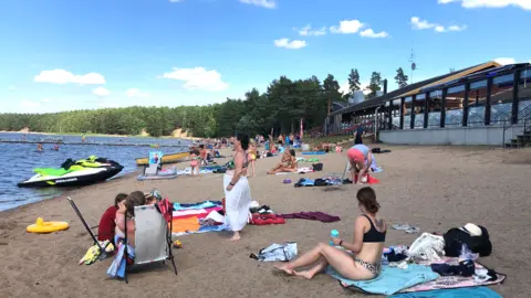 BBC Bathers on the shore of Lake Storsjön in Sweden