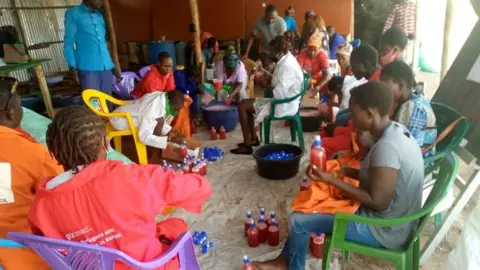 Innocent Havyariama A soap-making workshop in Kakuma