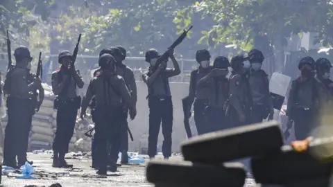 EPA Police officers search for hiding demonstrators