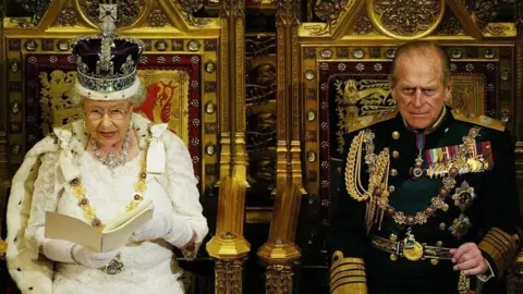 PA Media The Queen and Duke of Edinburgh at the 2013 State Opening of Parliament