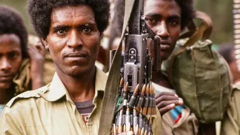 Getty Images Defeated and injured Ethiopian soldiers after the fall of Mengistu Haile Mariam