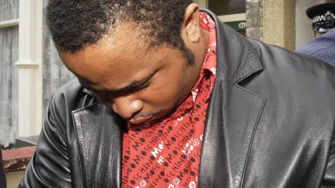 PA Media Kingsley Ojo arrested in Stratford, east London. in July 2003