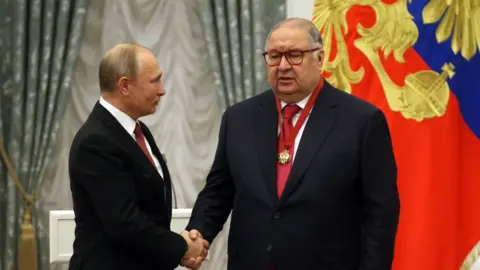 Getty Images Alisher Usmanov with President Putin at the Kremlin in November 2018