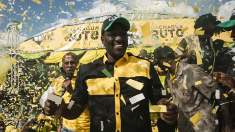 AFP William Ruto at a campaign rally in June 2022