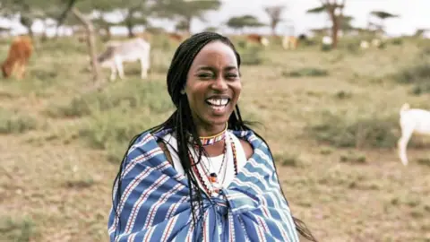 CJ_Pixels Nthenya Mwendwa in Kajiado County in Kenya wearing Maasai beads