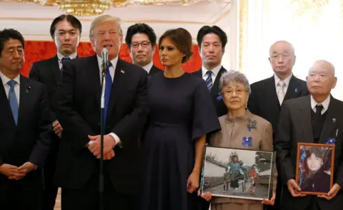 Reuters U.S. President Donald Trump speaks beside first lady Melania Trump and Japan's Prime Minister Shinzo Abe during a meeting with family members of Japanese citizens abducted by North Korea agents in the 1970s and 80s, at Akasaka Palace in Tokyo, Japan, 6 November 2017.