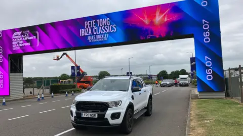 Kate Bradbrook/BBC Entrance to Silverstone circuit with dynamic gantry advertising Pete Tong