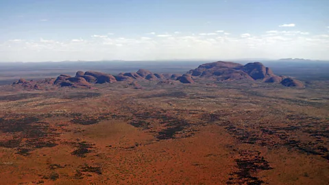 Torseten Blackwood/AFP/Getty Images The 36 granite and basalt conglomerate domes of Kata Tjuta (Credit: Torseten Blackwood/AFP/Getty Images)