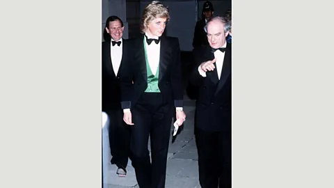 Alamy Diana gently challenged conventional royal dress codes by wearing a lot of black and tuxedo-style outfits (Credit: Alamy)
