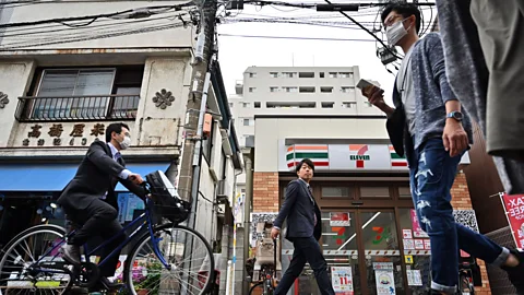 CHARLY TRIBALLEAU/AFP/Getty Images For many residents in Japan, convenience stores, known as ‘konbini’, are part of their daily routine (Credit: CHARLY TRIBALLEAU/AFP/Getty Images)