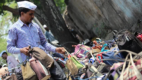 Getty Images Dabbawala, a 125-year-old delivery service in India, can now be used with an app. With satellite internet, more Indians could access such apps (Credit: Getty Images)