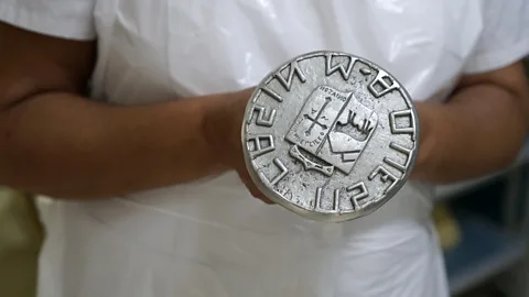 Linni Kral Every wheel of cheese is imprinted with a locally made decorative relief stamp (Credit: Linni Kral)