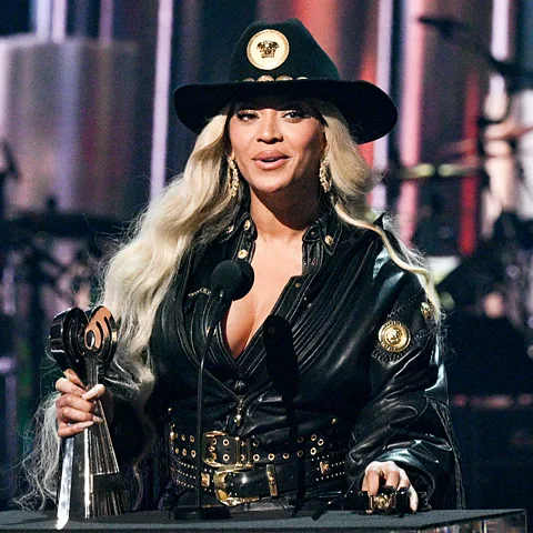 Getty Images Despite becoming a pop sensation in 2024, songs from Beyoncé's Cowboy Carter received little airplay on country radio, and she was snubbed by the CMA awards (Credit: Getty Images)