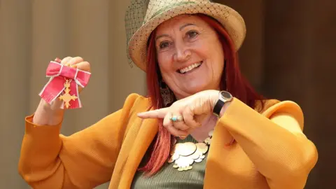 PA Lynne Franks with her OBE