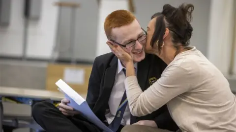 PA Media mother congratulates son