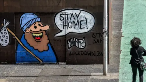 Getty Images Stay at home message on wall