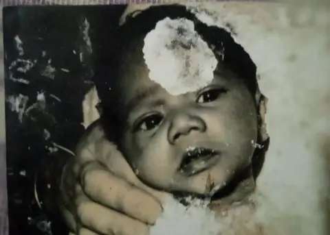 Handout A photo of Jagath before his adoption