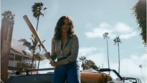 Netflix Sofía Vergara as Griselda Blanco wielding a baseball bat