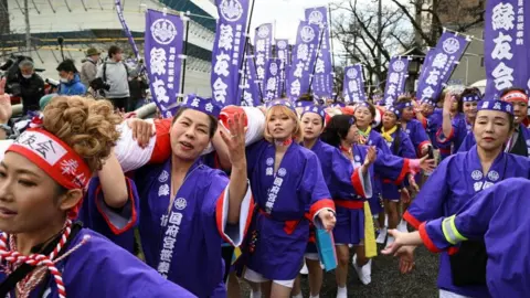 Reuters Women take part in a ritual event of naked festival