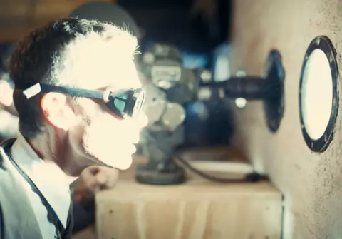 Alamy Cillian Murphy as Robert Oppenheimer seeing the test explosion